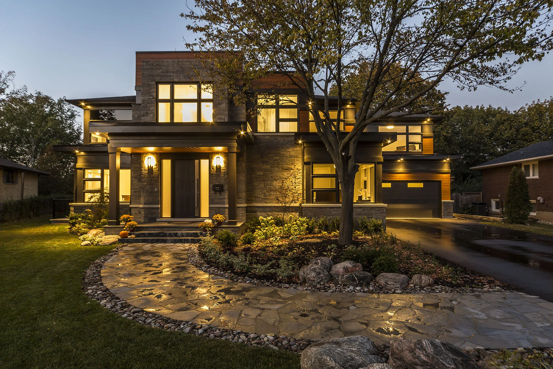 Contemporary Toronto home illuminated at dusk