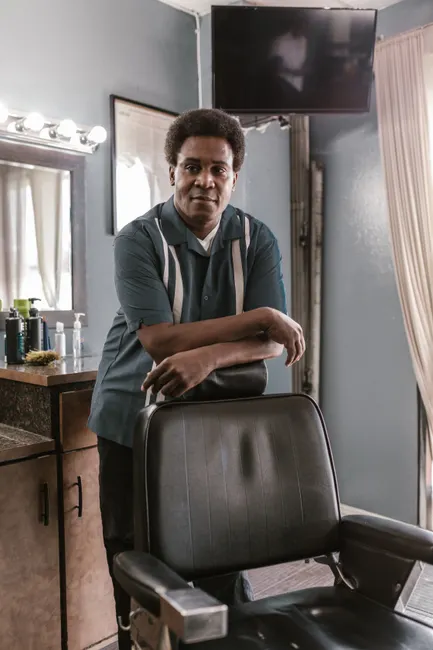 Barber working carefully with clippers